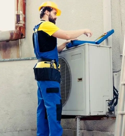 Technician cleaning HVAC vent in Plainfield IL